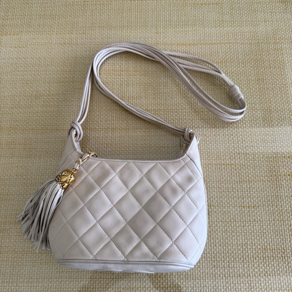 CHANEL Quilted CC Tassel Crossbody Bag Cream